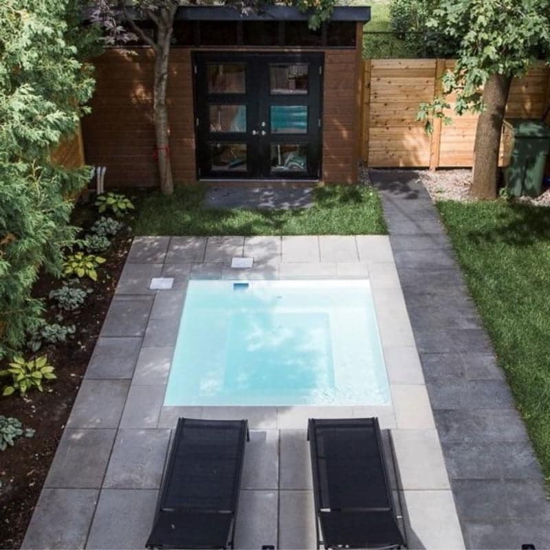Fiberglass inground pool in backyard | Nautika Pools